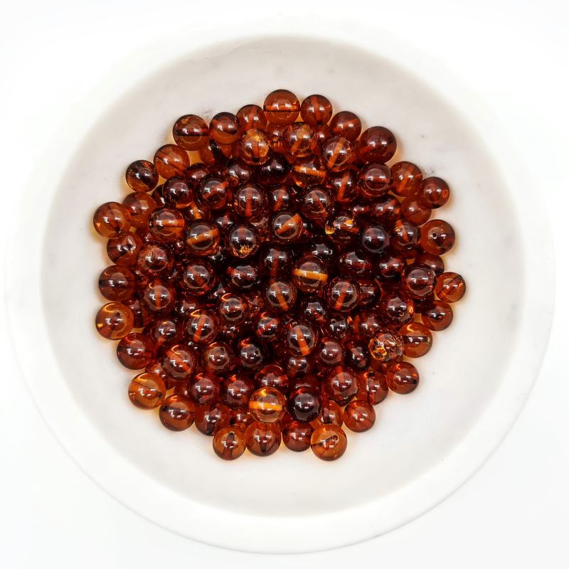 Round amber beads - Cognac color